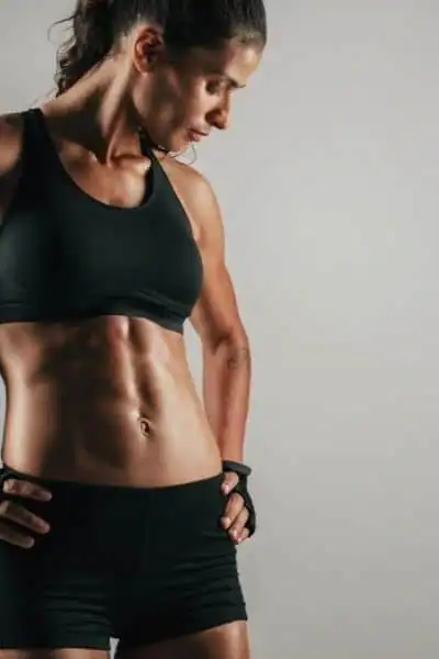 Toning Up at Home: The Ultimate Guide to Bodyweight Exercises 2 Image of woman's toned stomach after bodyweight exercises Weybridge and non-surgical treatment from Lipo 360